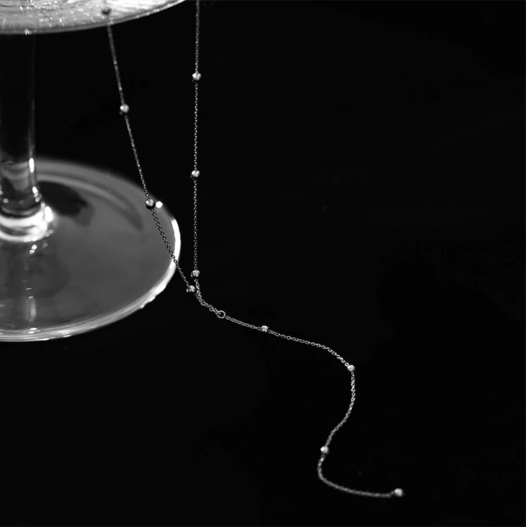 Necklace with Emblem and Cross