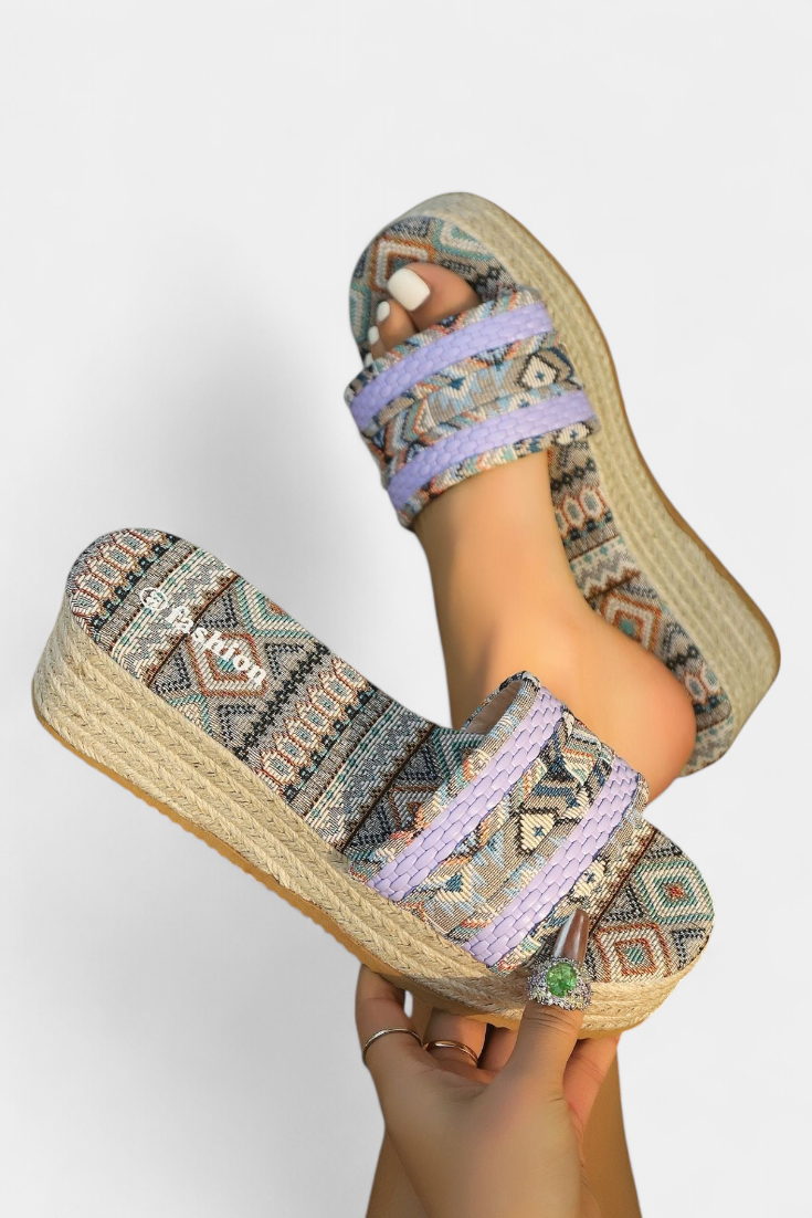 Dorotea Flat sandals with double strap and ethnic woven sole