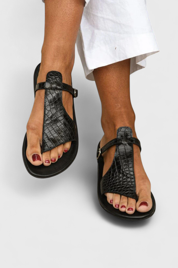 Tavia Black buckle sandals with embossed Animal Print detail