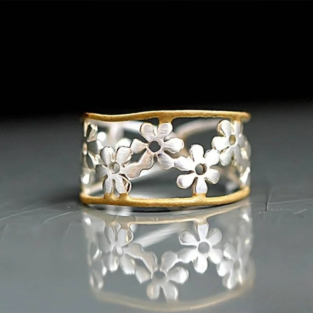 Irregular ring with flowers and blank design