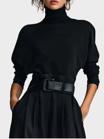 Amara | Two-piece set with a solid black long-sleeve turtleneck top and straight-leg trousers.